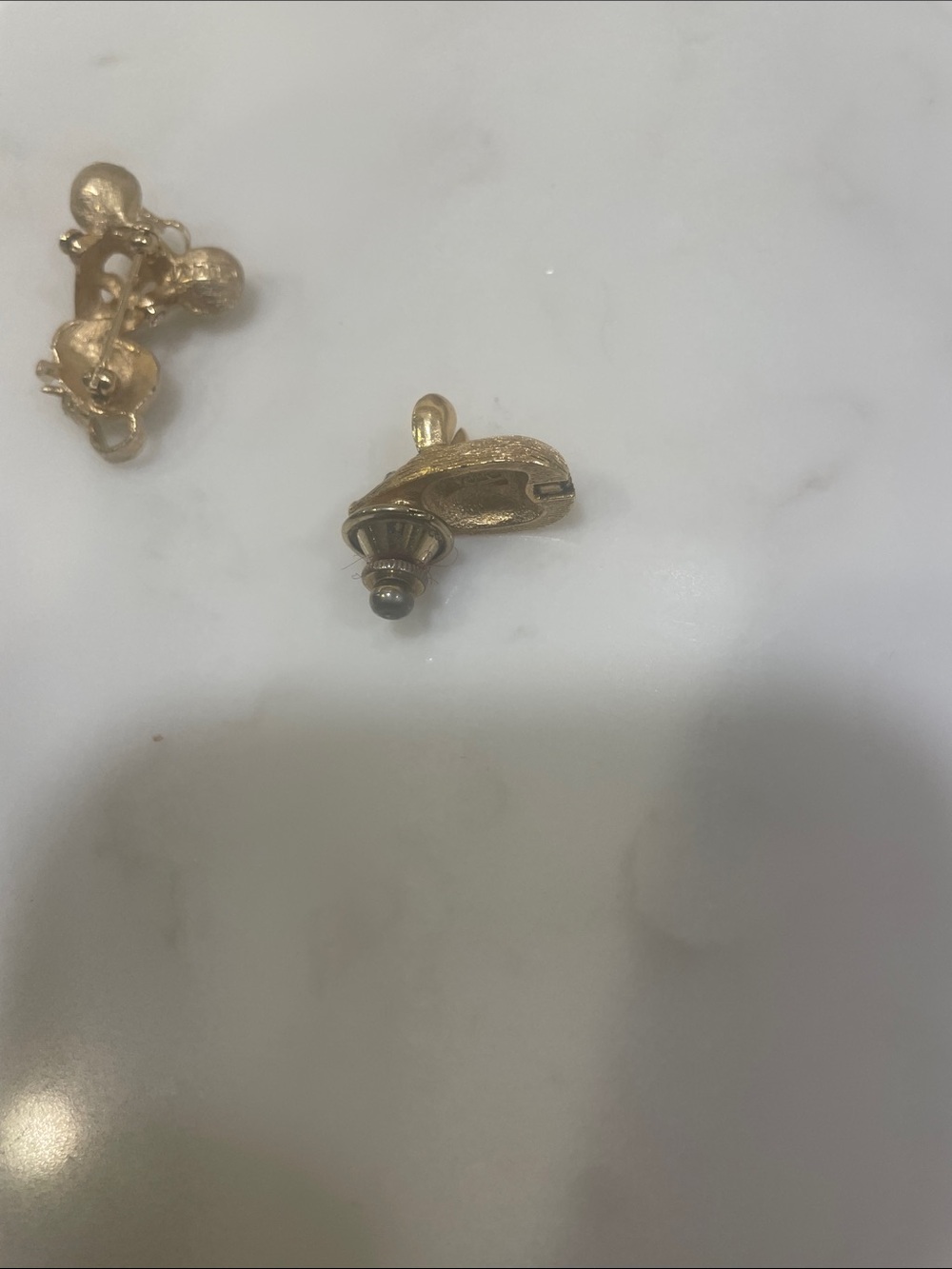 Two vintage mouse pins